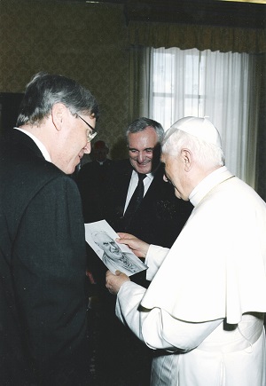 An Taoiseach, Bertie Ahern, presenting Mark's portrait to Pope Benedict XVI.  Vatican, 7 July 2005.